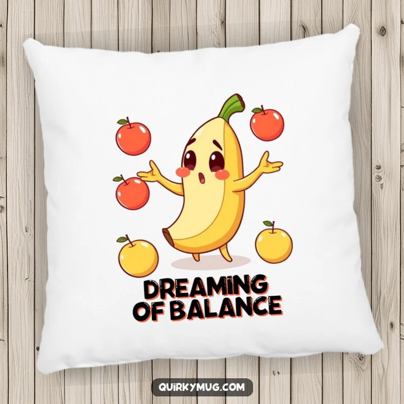 Funny pillow showing a surprised banana character mid-slip on its peel while juggling apples.