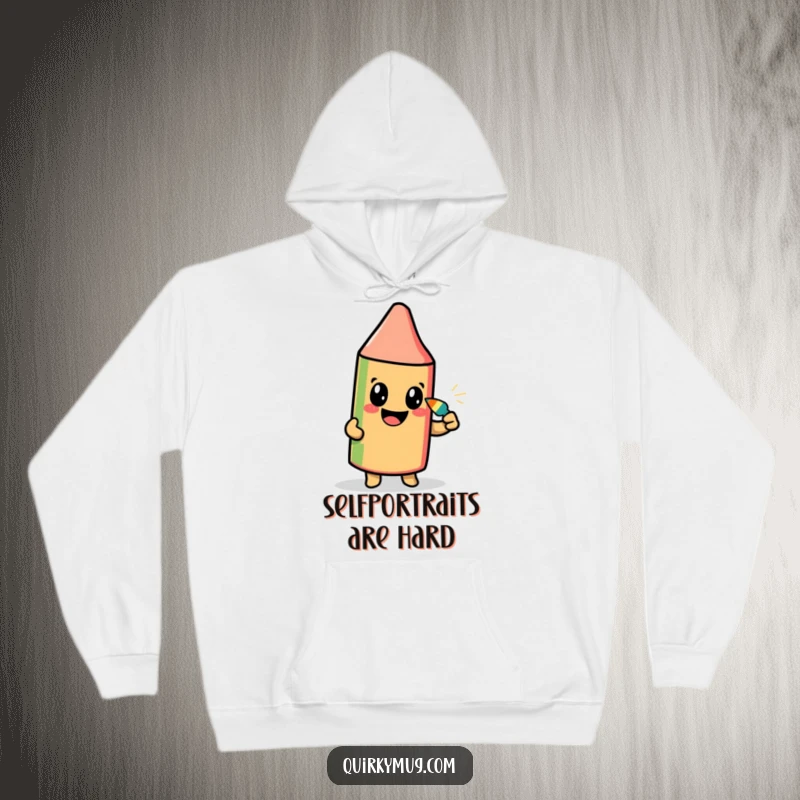 Funny hoodie showcasing a beaming crayon character diligently drawing its self-portrait using its own tip, cozy and witty.