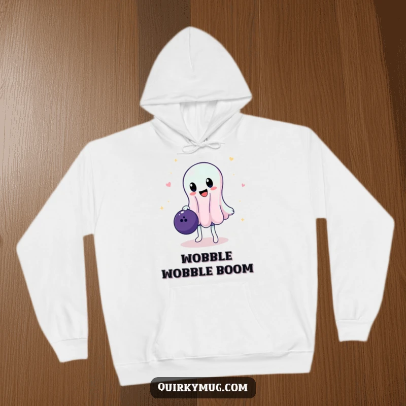 Funny hoodie with a translucent, jelly character struggling to balance a large bowling ball, conveying a sense of comical struggle and determination.