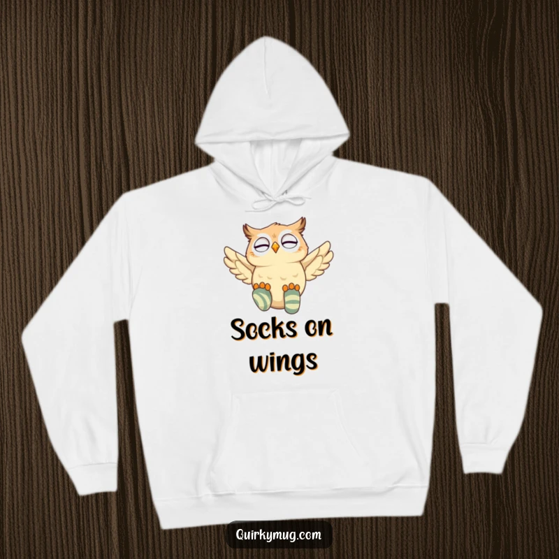 Funny owl character in a cozy hoodie, attempting flight with oversized mismatched socks, giggling with pure joy.