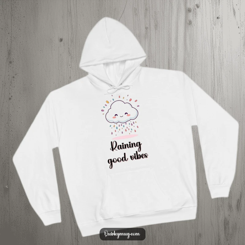 Funny cloud character raining large sprinkles, printed on a soft and cozy hoodie.