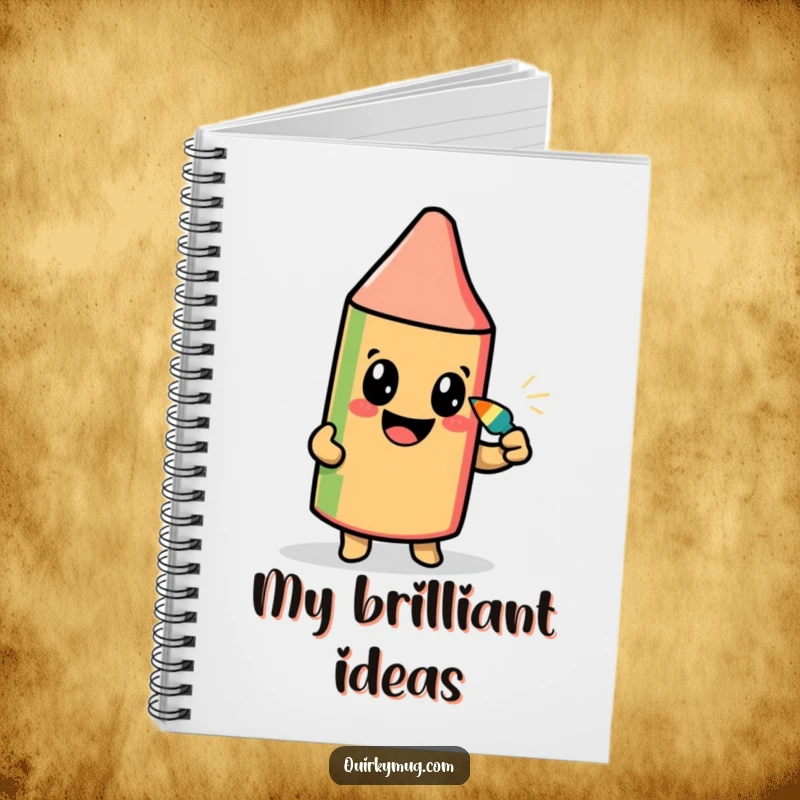 Funny notebook depicting a beaming crayon character attempting to draw its self-portrait with its pointed tip, for creative minds.