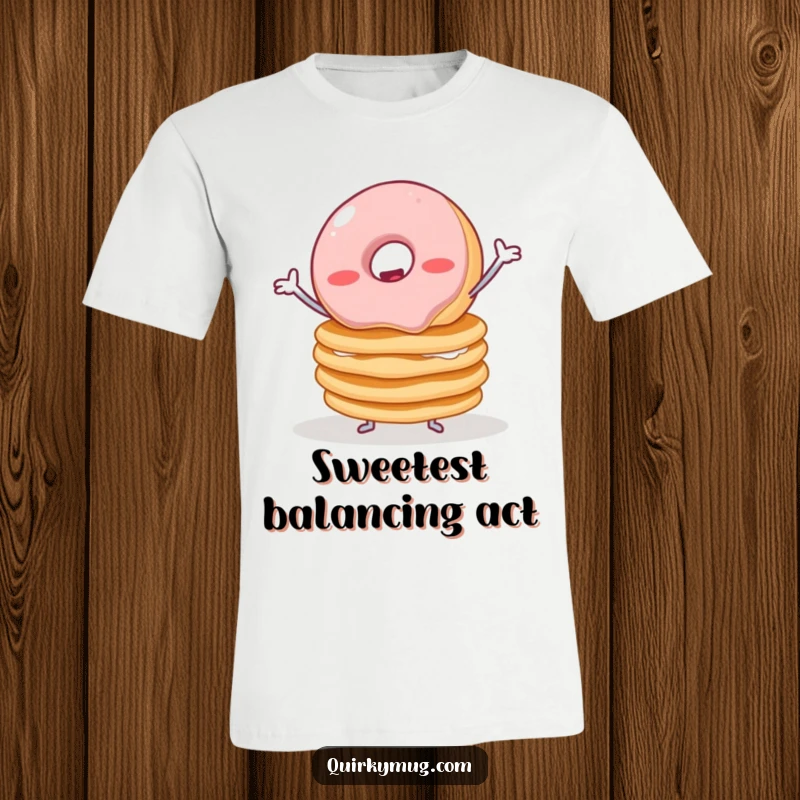 Funny t-shirt showing a wobbly jelly donut with tiny arms trying to keep a stack of pancakes from toppling, representing breakfast struggles.